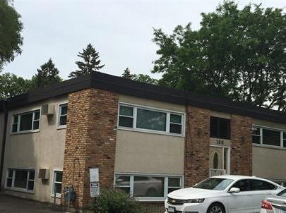 7673 River Rd, Fridley, MN 55432 - view of side of property with stucco siding