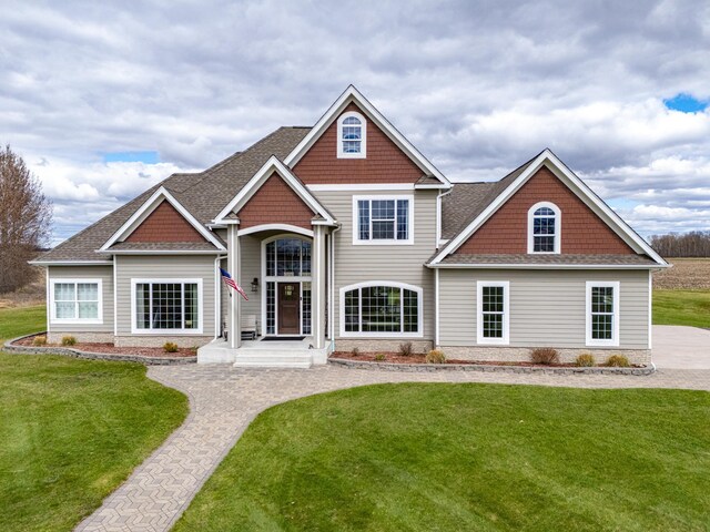 37854 210th Ave SE, Knute Twp, MN 56535 - craftsman inspired home featuring a front lawn and a shingled roof