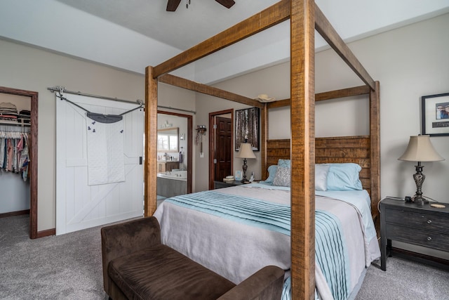 37854 210th Ave SE, Knute Twp, MN 56535 - bedroom featuring carpet, a walk in closet, a closet, ensuite bathroom, and baseboards