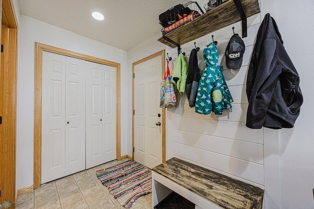 mudroom featuring baseboards