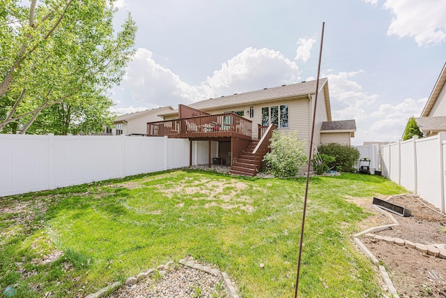 rear view of property featuring stairway and a wooden deck