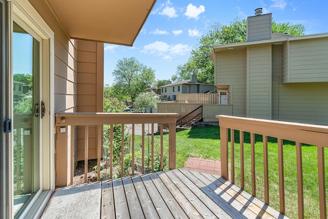 2111 Tamarin Trl, Golden Valley, MN 55427 - wooden terrace featuring a lawn