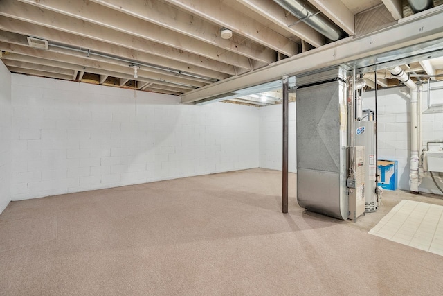 2111 Tamarin Trl, Golden Valley, MN 55427 - unfinished basement featuring heating unit, water heater, and light carpet