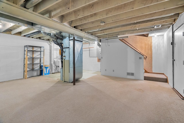 2111 Tamarin Trl, Golden Valley, MN 55427 - unfinished basement featuring electric panel, heating unit, carpet floors, and concrete block wall