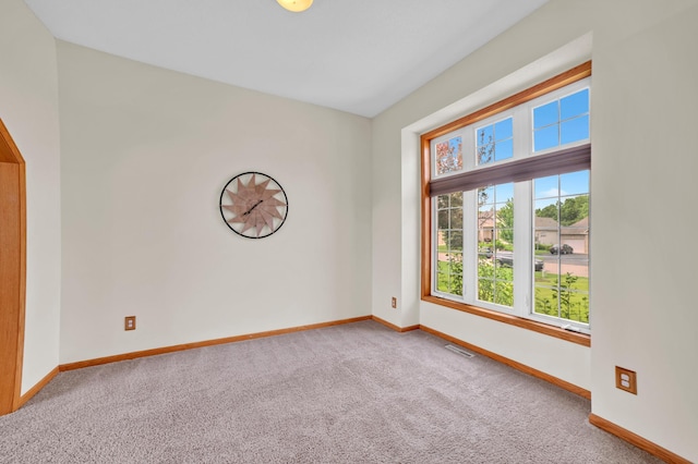 13883 Holly St NW, Andover, MN 55304 - empty room featuring carpet and baseboards
