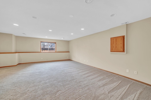 13883 Holly St NW, Andover, MN 55304 - empty room with carpet, baseboards, and recessed lighting