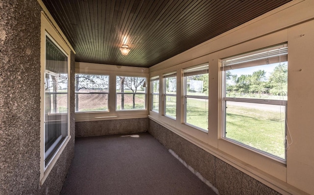 23142 Denmark Ave, Castle Rock Twp, MN 55024 - unfurnished sunroom featuring carpet floors and wooden ceiling