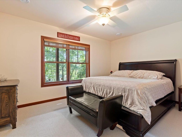 26746 County Road 4, Nisswa, MN 56468 - bedroom featuring light carpet, baseboards, and a ceiling fan