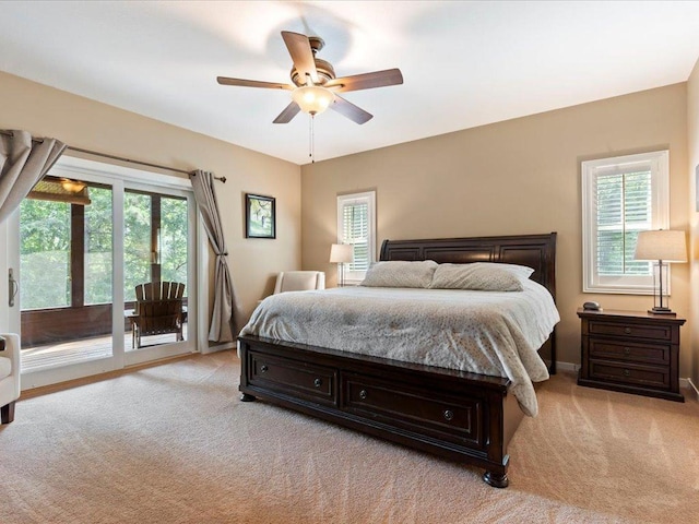 26746 County Road 4, Nisswa, MN 56468 - bedroom with light colored carpet, access to exterior, and multiple windows