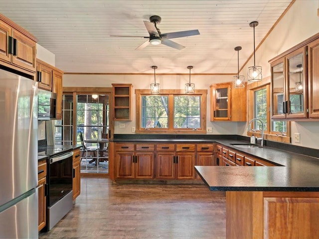 26746 County Road 4, Nisswa, MN 56468 - kitchen with appliances with stainless steel finishes, a sink, dark countertops, wooden ceiling, and brown cabinetry