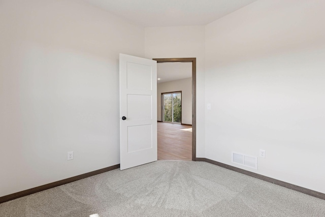 21346 Cottonwood St NW, Oak Grove, MN 55011 - empty room with carpet and baseboards