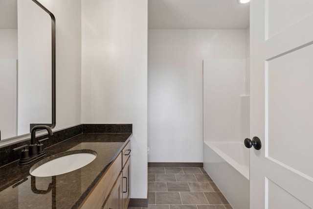 21346 Cottonwood St NW, Oak Grove, MN 55011 - full bathroom featuring vanity, toilet, shower / tub combination, and baseboards