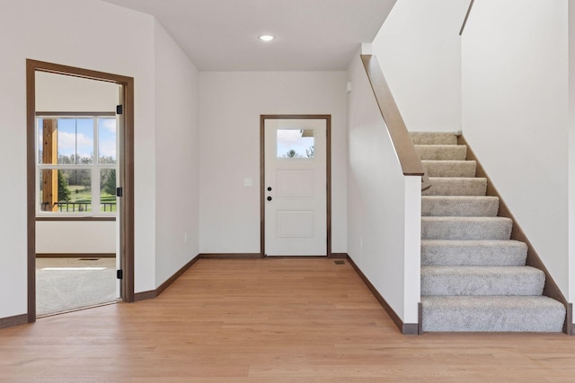 21346 Cottonwood St NW, Oak Grove, MN 55011 - entryway featuring stairway, light wood-type flooring, baseboards, and recessed lighting