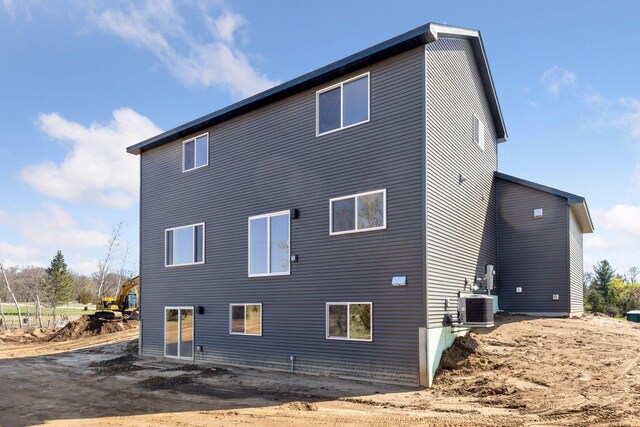 21346 Cottonwood St NW, Oak Grove, MN 55011 - rear view of property with central AC unit