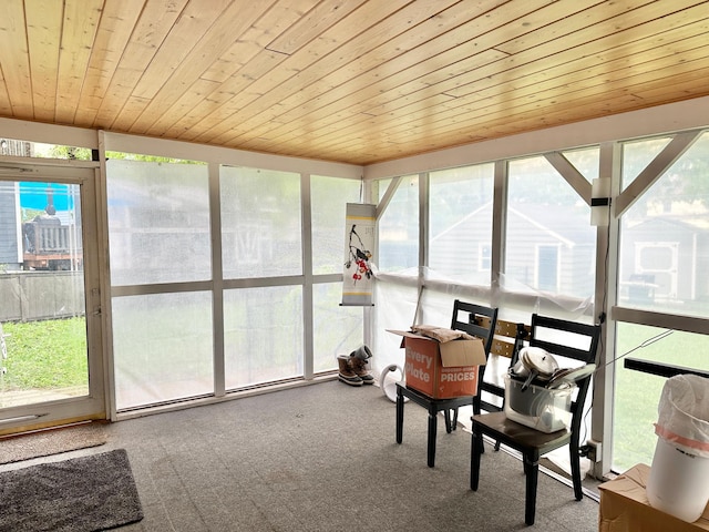 1429 Circle Dr, Albert Lea, MN 56007 - sunroom with carpet, wood ceiling, healthy amount of natural light, and expansive windows