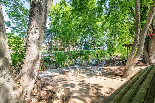 view of patio featuring a fire pit