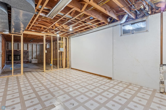 below grade area featuring tile patterned floors