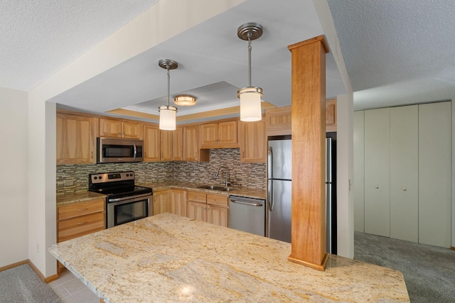 2885 Knox Ave S Unit 208, Minneapolis, MN 55408 - kitchen featuring stainless steel appliances, a sink, tasteful backsplash, a tray ceiling, and a textured ceiling