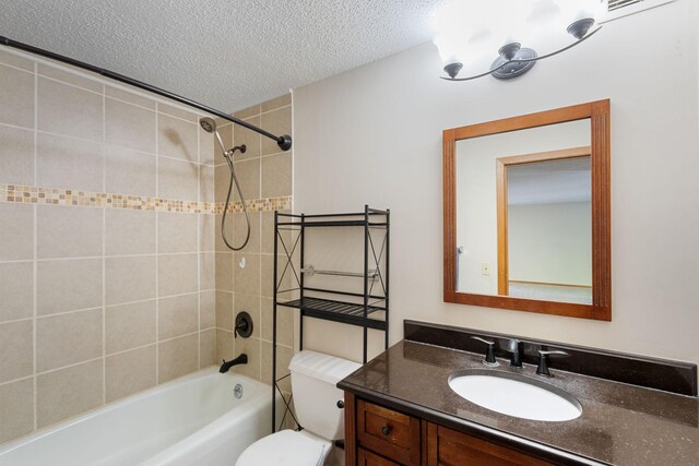 2885 Knox Ave S Unit 208, Minneapolis, MN 55408 - full bathroom featuring toilet, bathtub / shower combination, a textured ceiling, and vanity