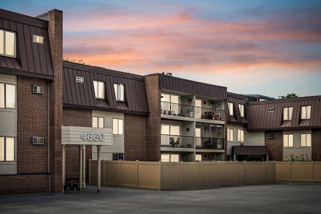 4860 Park Commons Dr Unit 309, Saint Louis Park, MN 55416 - property at dusk featuring fence