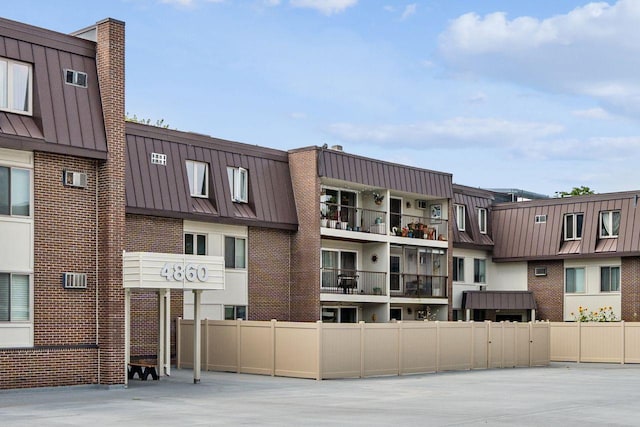 4860 Park Commons Dr Unit 309, Saint Louis Park, MN 55416 - view of apartment building / complex with a wall mounted AC