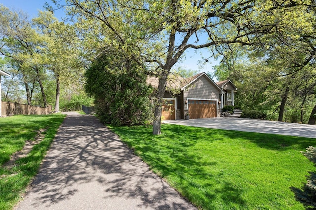 view of front of house with a garage and driveway