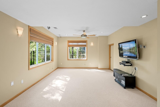 unfurnished living room with baseboards, carpet, a ceiling fan, and recessed lighting