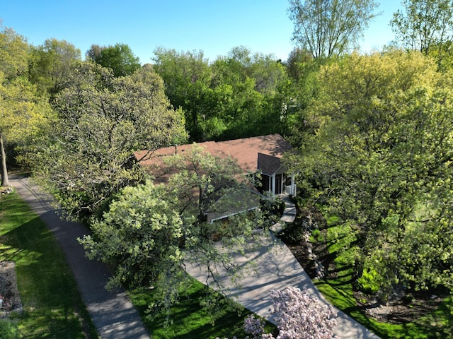 view from above of property featuring a forest