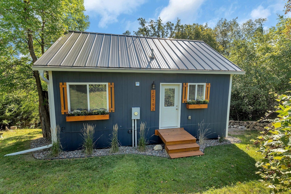 20792 Elkview Rd, Munson Twp, MN 56368 - view of front of property featuring a front lawn and metal roof