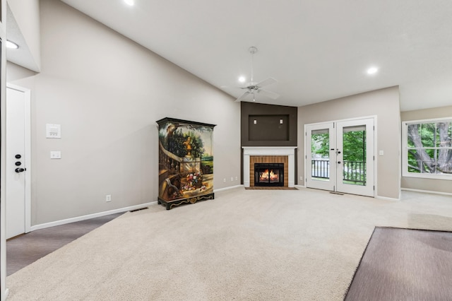 10911 Rhode Island Ave S, Bloomington, MN 55438 - unfurnished living room with ceiling fan, carpet floors, recessed lighting, baseboards, and a brick fireplace