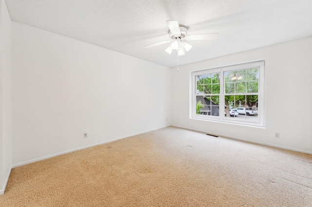 10911 Rhode Island Ave S, Bloomington, MN 55438 - carpeted spare room featuring baseboards and ceiling fan