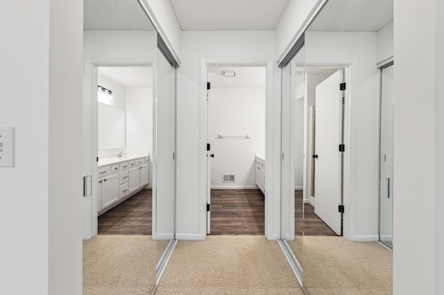 10911 Rhode Island Ave S, Bloomington, MN 55438 - corridor with light carpet and baseboards