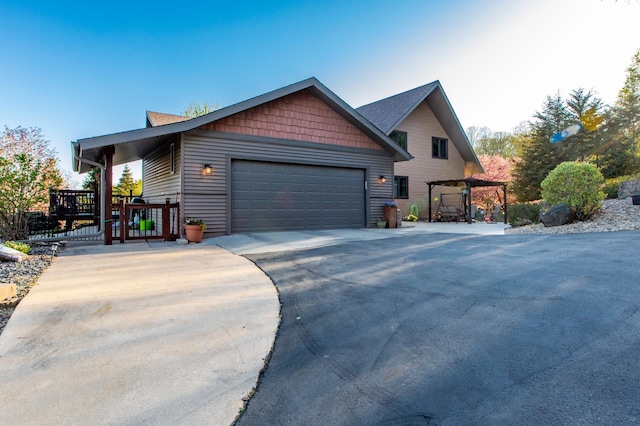 6385 13th Ave NW, Rochester, MN 55901 - view of front facade with asphalt driveway and an attached garage