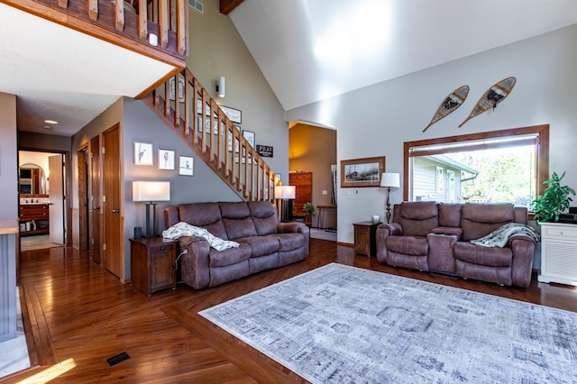 6385 13th Ave NW, Rochester, MN 55901 - living area with high vaulted ceiling, wood finished floors, stairway, and arched walkways