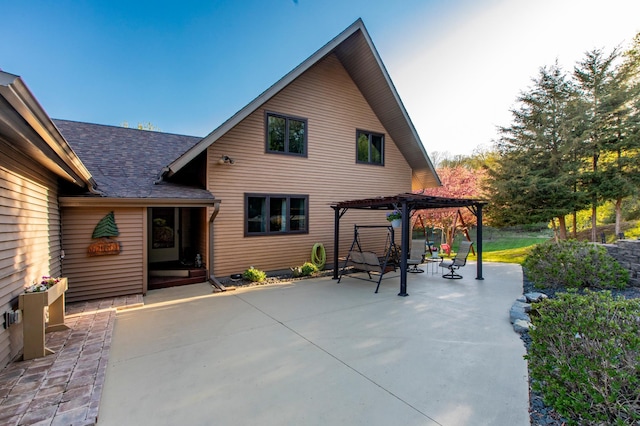 6385 13th Ave NW, Rochester, MN 55901 - rear view of house featuring a pergola, a patio, and roof with shingles