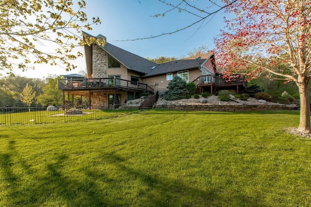 6385 13th Ave NW, Rochester, MN 55901 - rear view of property with a deck, stone siding, and stairway