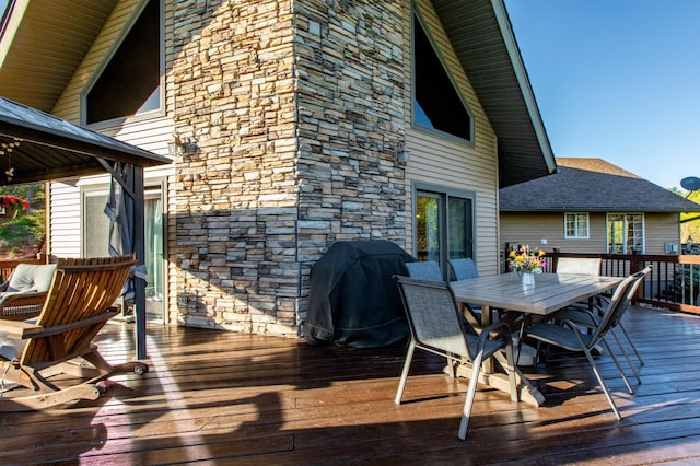 6385 13th Ave NW, Rochester, MN 55901 - deck featuring outdoor dining space, area for grilling, and a gazebo