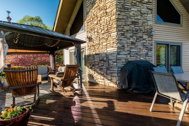 6385 13th Ave NW, Rochester, MN 55901 - wooden terrace with a gazebo, area for grilling, and outdoor lounge area
