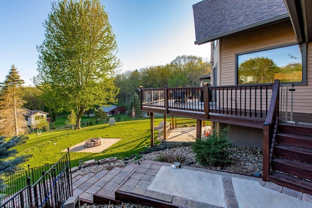 6385 13th Ave NW, Rochester, MN 55901 - view of yard featuring a fire pit, a deck, and a patio