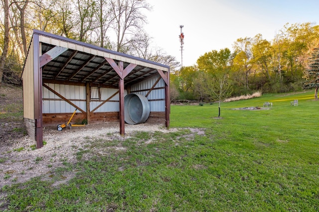 6385 13th Ave NW, Rochester, MN 55901 - view of green lawn with an outbuilding and a carport