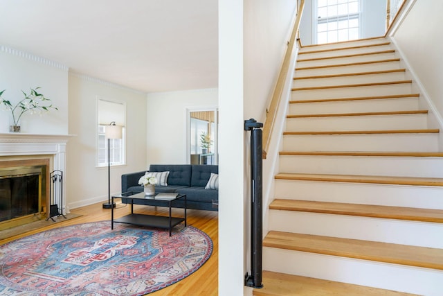 623 Fairview Ave S, Saint Paul, MN 55116 - stairs with wood finished floors and a fireplace with flush hearth