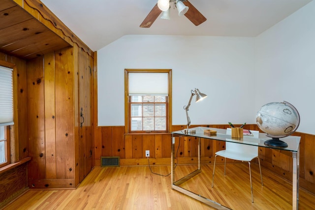 623 Fairview Ave S, Saint Paul, MN 55116 - unfurnished office with wood walls, a wainscoted wall, wood finished floors, lofted ceiling, and a ceiling fan