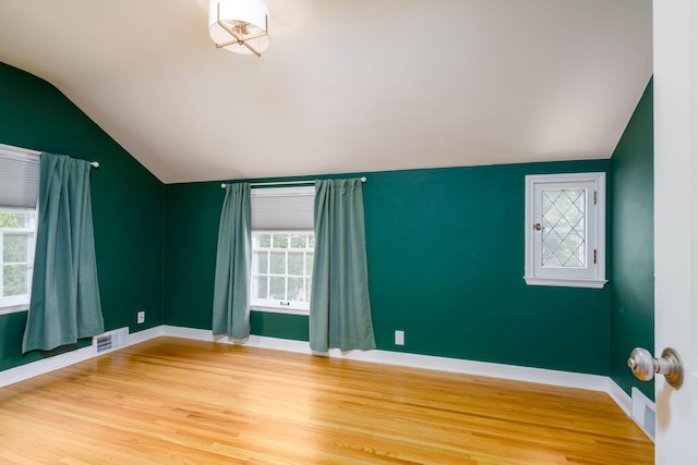623 Fairview Ave S, Saint Paul, MN 55116 - empty room featuring lofted ceiling and wood finished floors