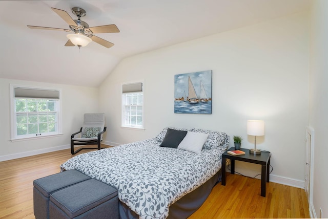 623 Fairview Ave S, Saint Paul, MN 55116 - bedroom with wood finished floors, vaulted ceiling, and a ceiling fan