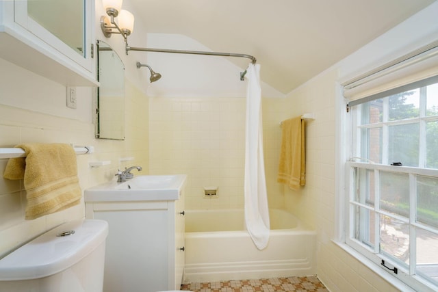 623 Fairview Ave S, Saint Paul, MN 55116 - full bathroom with tile walls, shower / tub combo, and vanity