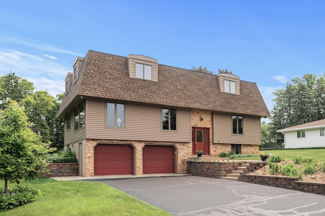 4824 Eriks Blvd, Eagan, MN 55122 - split foyer home with a shingled roof, a garage, driveway, mansard roof, and brick siding