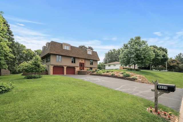 4824 Eriks Blvd, Eagan, MN 55122 - view of front of property with an attached garage, roof with shingles, asphalt driveway, mansard roof, and a front lawn