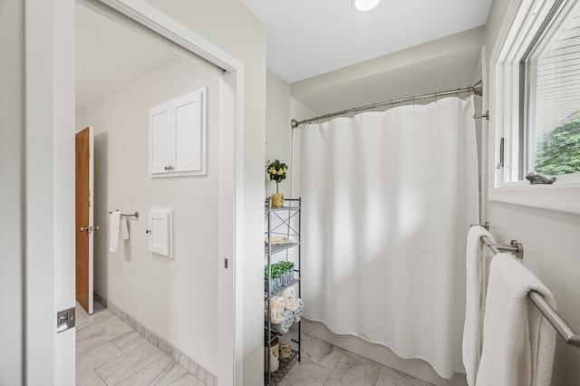 4824 Eriks Blvd, Eagan, MN 55122 - bathroom featuring marble finish floors, a shower with curtain, baseboards, and recessed lighting