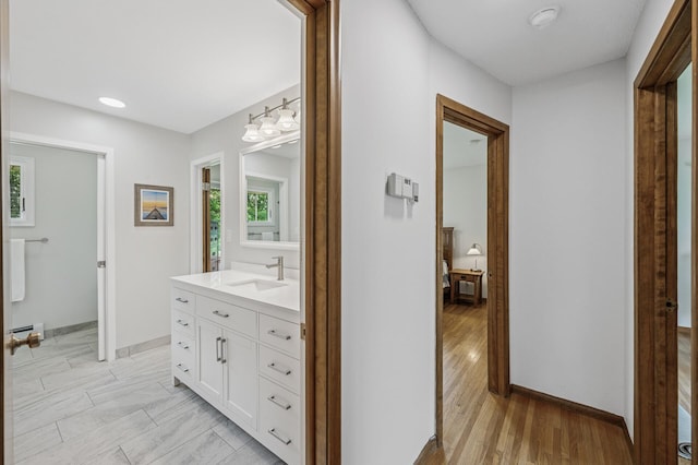 4824 Eriks Blvd, Eagan, MN 55122 - bathroom featuring vanity and baseboards