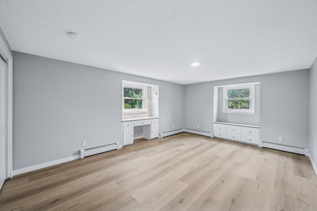 4824 Eriks Blvd, Eagan, MN 55122 - unfurnished living room with a baseboard radiator, light wood-style floors, baseboards, recessed lighting, and a textured ceiling